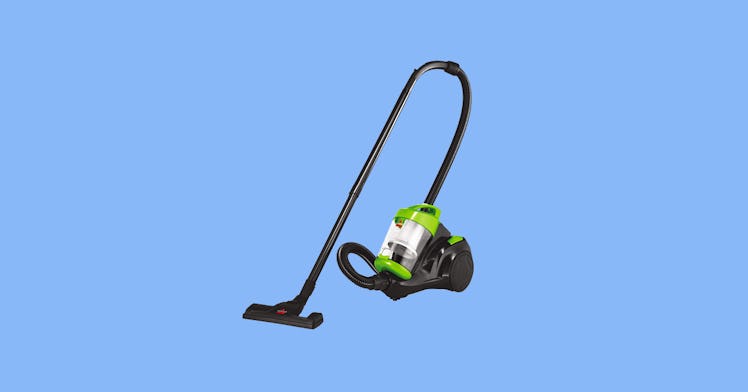 A green vacuum cleaner for home carpet
