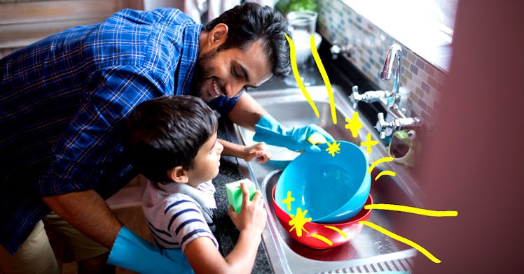 A father and a son washing dishes together