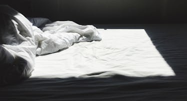 grey scale edit of crumpled sheets