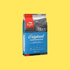 Dry Dog Food by Orijen in front of a yellow background