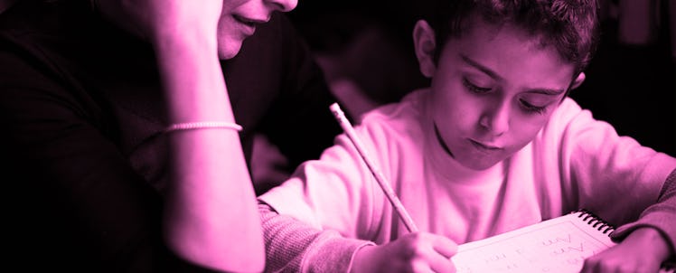 A mother doing homework with her bilingual son