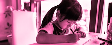 A 7-Year-Old girl doing her homework