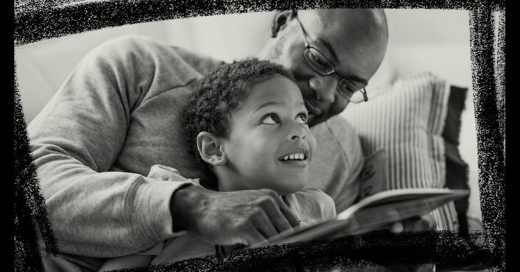 A father and son reading a book together