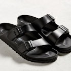 A pair of black everyday Birkenstock sandals 