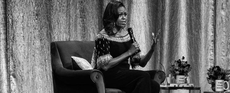 Michelle Obama talking into a microphone in London