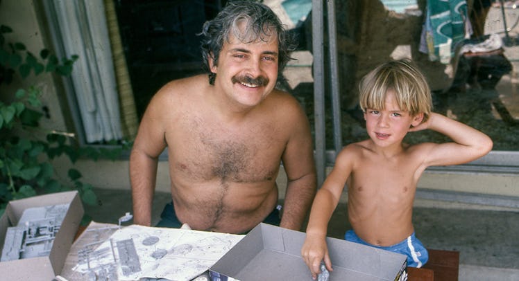 A dad and his son on a terrace 