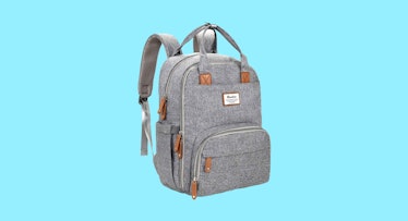 A grey diaper bag backpack