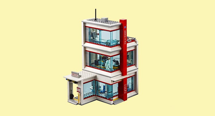 architecture lego city set displayed on a yellow backdrop