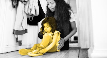 Kindergartner practicing tying their shoes with a parent
