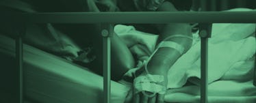 A patient with a brain tumor lying down in a hospital bed