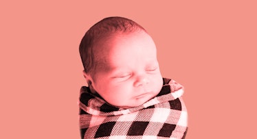 sepia edit of a baby wrapped in a plaid blanket
