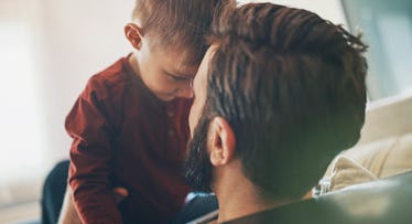 A father playing with his son