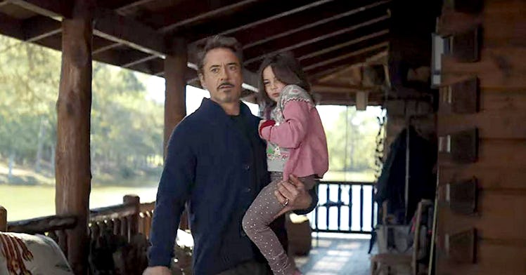 Robert Downey Jr. holding his "Avengers" on-screen daughter, Lexi Rabe, who was recently bullied by ...