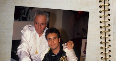 Evel Knievel posing with his son, the picture is located in a photo album