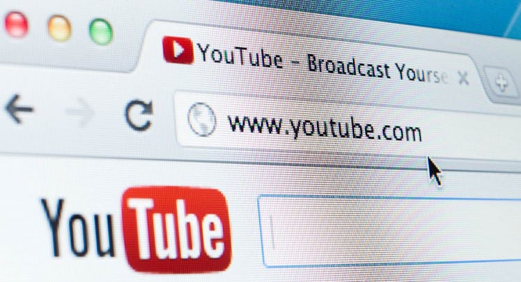 The search bar of the Safari browser with "www.youtube.com" typed in it, with the YouTube page slowl...