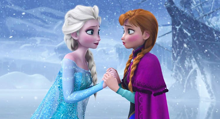 Elsa and Anna holding hands at the end of Frozen