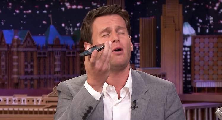 Jonathan Groff singing into a phone for Jimmy Fallon's kids during the Tonight Show