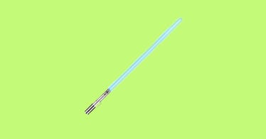 Star Wars blue Lightsaber toy against green background