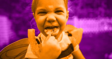 sepia edit of a kid eating candy and laughing at a scarily corny Halloween joke against purple backg...