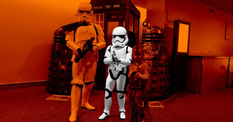 A family in Halloween costumes with an orange color filter with a boy in a Star Wars Stormtrooper co...