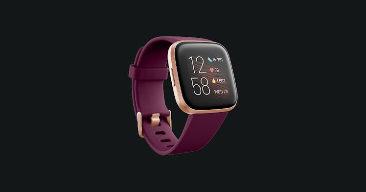 A purple Fitbit Versa 2 health and fitness smartwatch