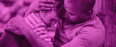 A father holding his son in a warm embrace, covered by a purple color filter
