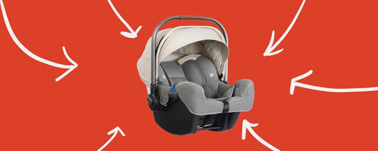 Nuna Pipa Car Seat on a red background with white arrows on the sides 