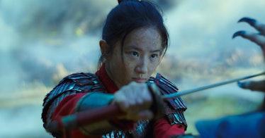 Liu Yifei as Hua Mulan holding a sword in a scene from the movie 'Mulan'