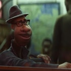 Joe Gardner voiced by Jamie Fox from disneys movie soul rides the bus while looking out of the windo...