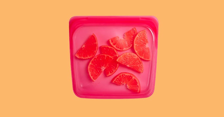 Stasher raspberry color food storage bag with grapefruit slices