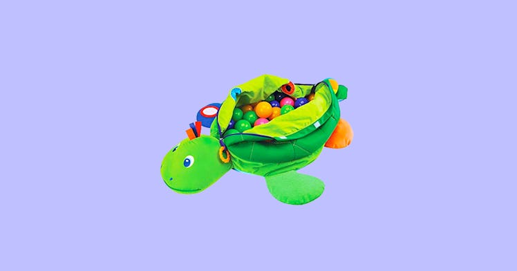 A ball pit for kids, in this case our pick for the best one, set against a purple backdrop