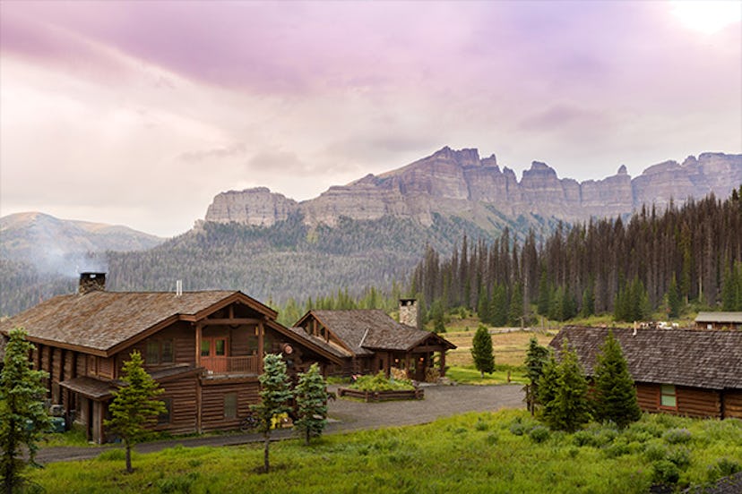 Small wooden houses that make up Brooks Lake Lodge & Spa from Dubois in Wyoming