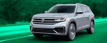 silver 2021 volkswagen atlas driving through the road