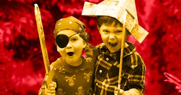 sepia photo edit of two kids dressed as pirates joking around against a red background