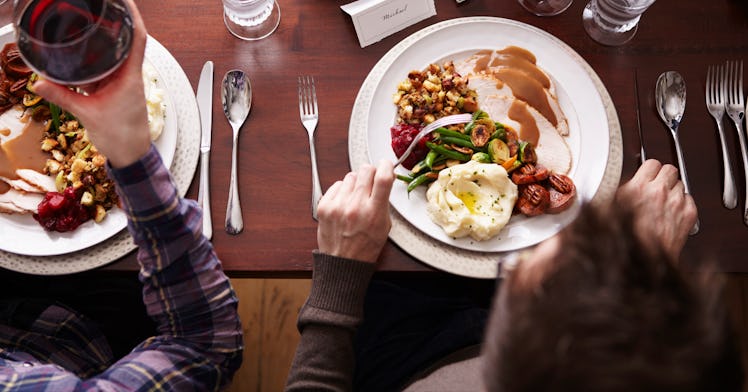 Thanksgiving dinner plate with glass of wine