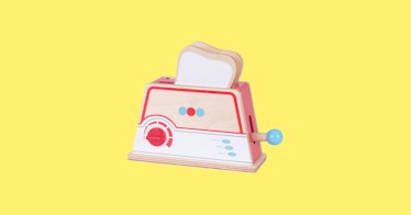a play food set includes a toaster and slice of bread