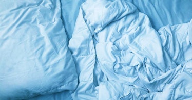 Plain, white, wrinkly sheets.