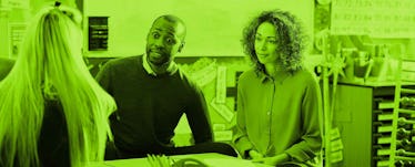 green image of husband and wife with teacher at parent-teacher conference