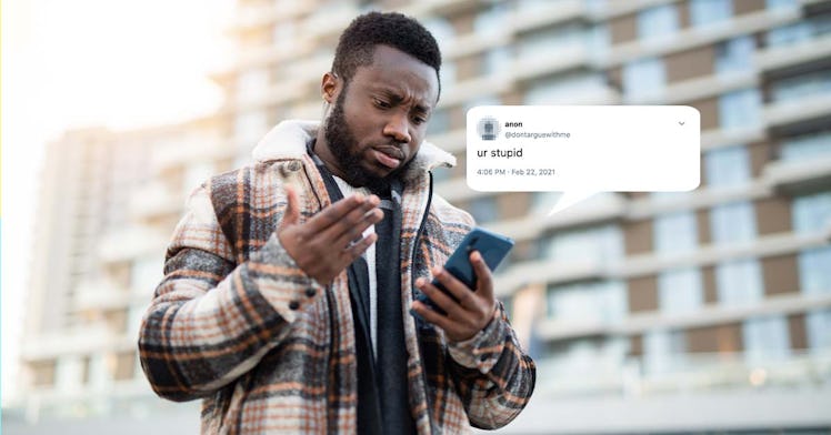 Man looking at text bubble and trying to respond