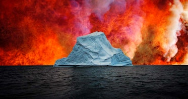 Anger iceberg surrounded by water with with red clouds overhead