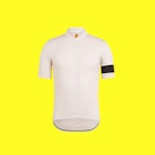 A white cycling jersey with a black stripe on the arm, one of our picks for men's cycling clothing, ...