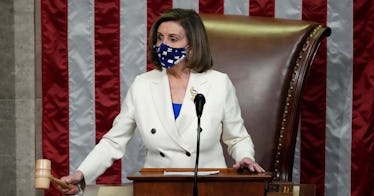 House leader Nancy Pelosi wears a white suit