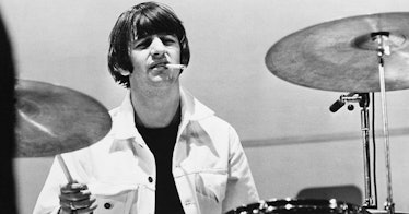 Ringo Starr playing the drums with the Beatles