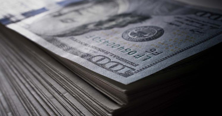 A stack of money of 100 dollar bills