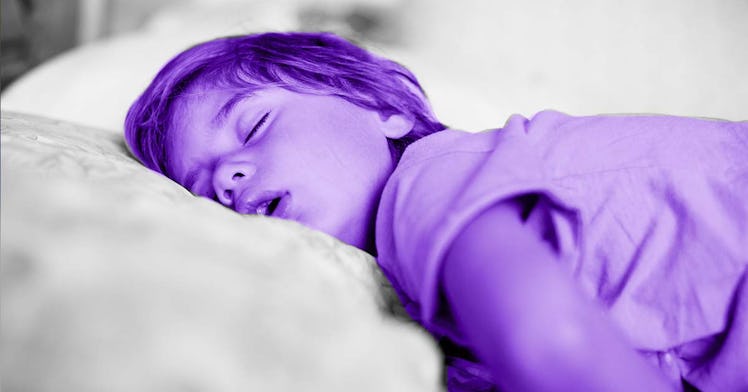 A child sleeps in purple