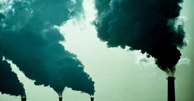 smokestacks burn gases into the air