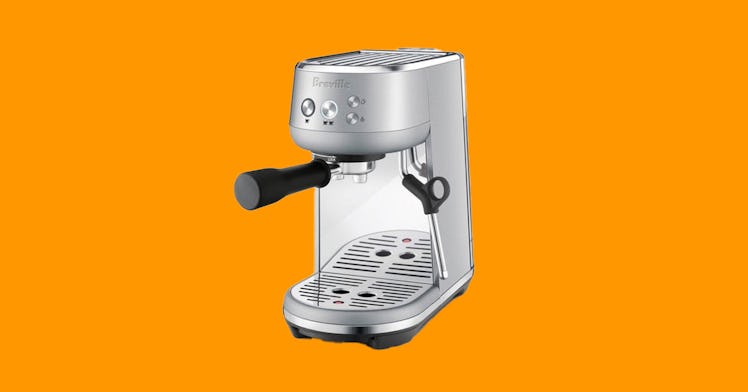 The The Bambino by Breville Espresso machine on an orange background