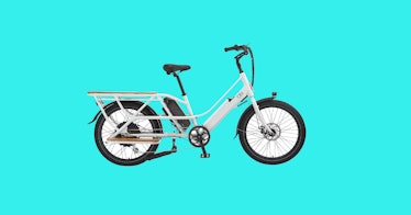 a silver family-size cargo bike against a turquoise background
