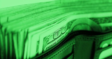 A pile of cash in bright green overlay color