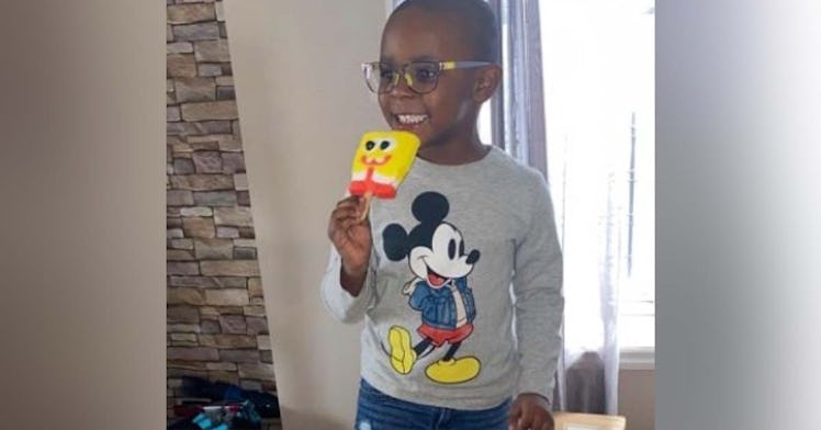 Noah Bryant holds a SpongeBob popsicle